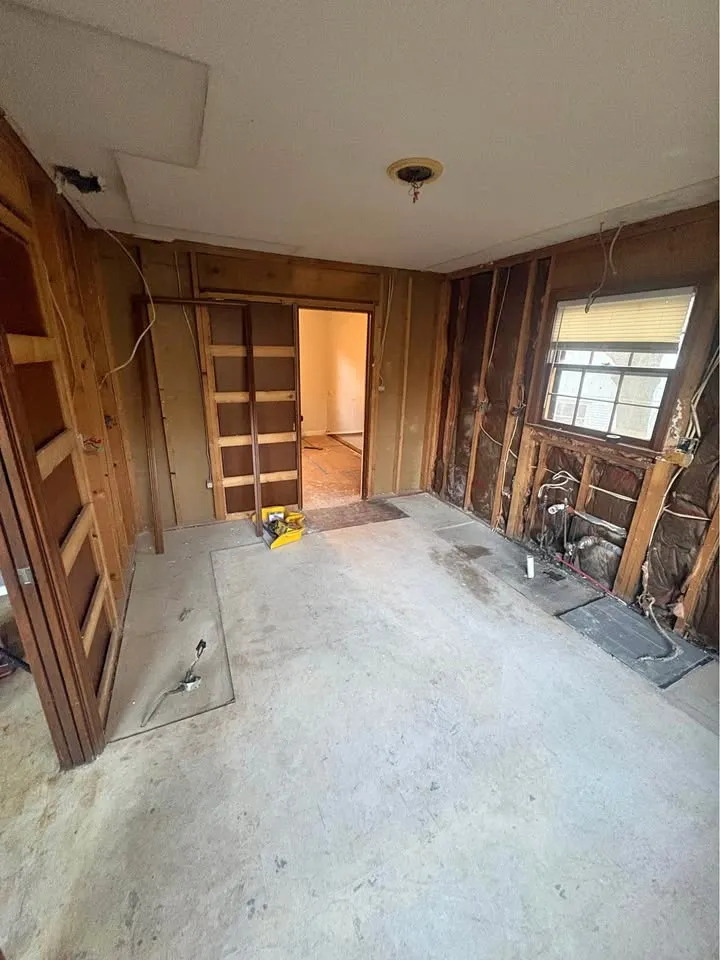 Room with selected floor and wall finishes removed