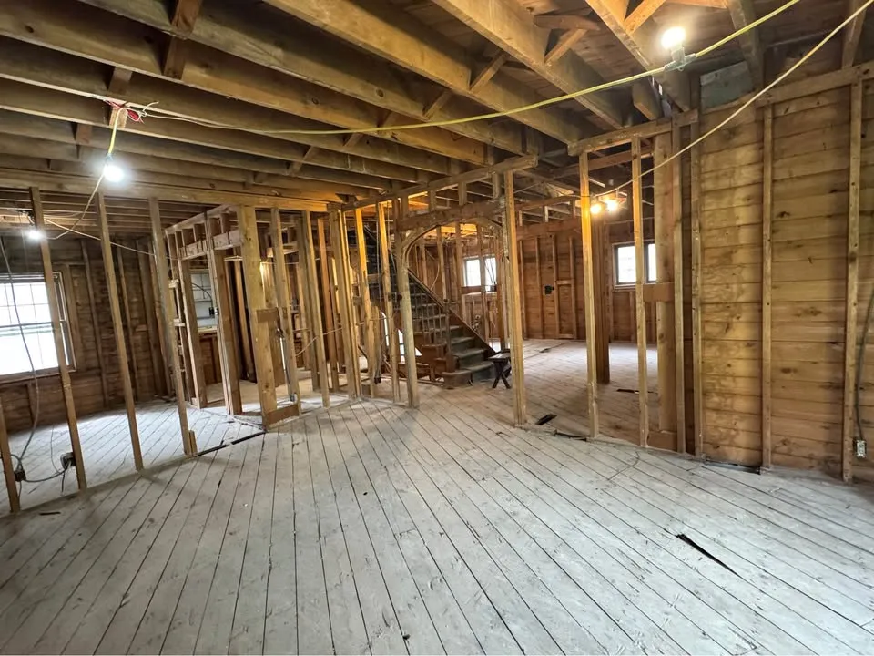 Large room stripped back to structural framing