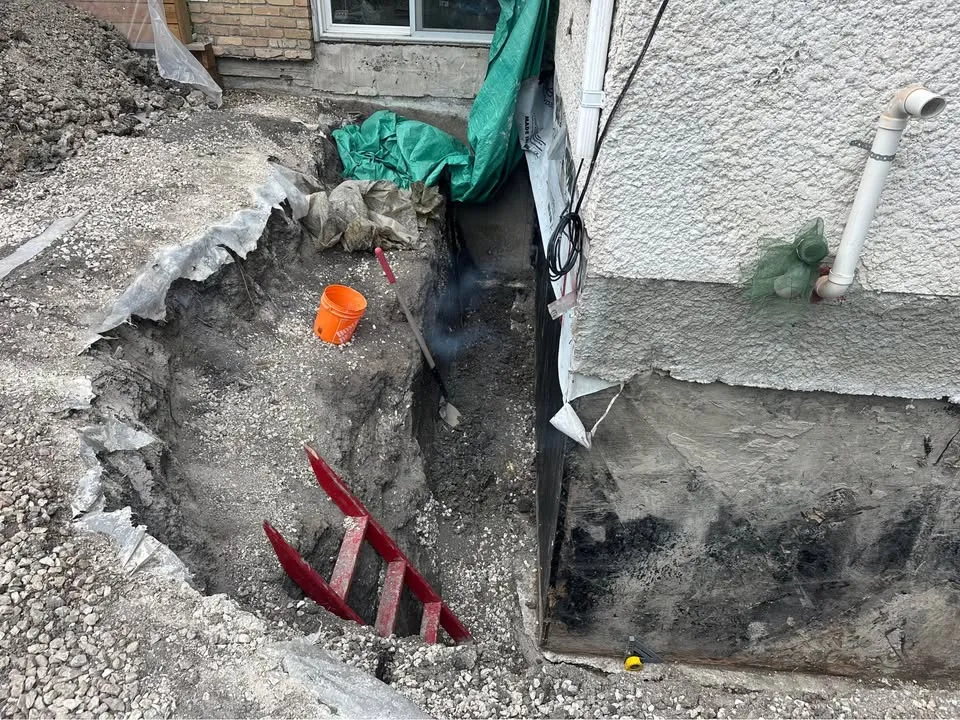 Narrow trench cut through exterior concrete